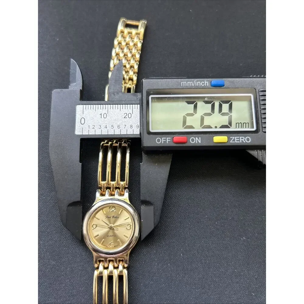 Fred Belay Gold Tone Silver Bezel Women’s Quartz Watch